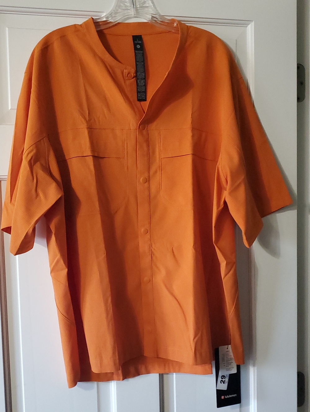 NWT Lululemon WovenAir Cargo Pocket Short Sleeve Mens L Orange